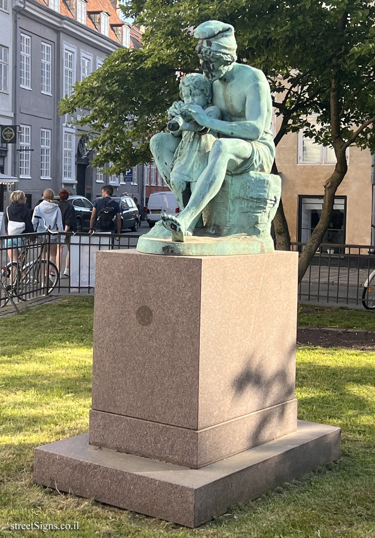 Copenhagen - "A Neapolitan Fisherman Teaches His Son to Play the Flute" outdoor sculpture by Otto Evens - Lille Strandstræde 20, 1254 København, Denmark